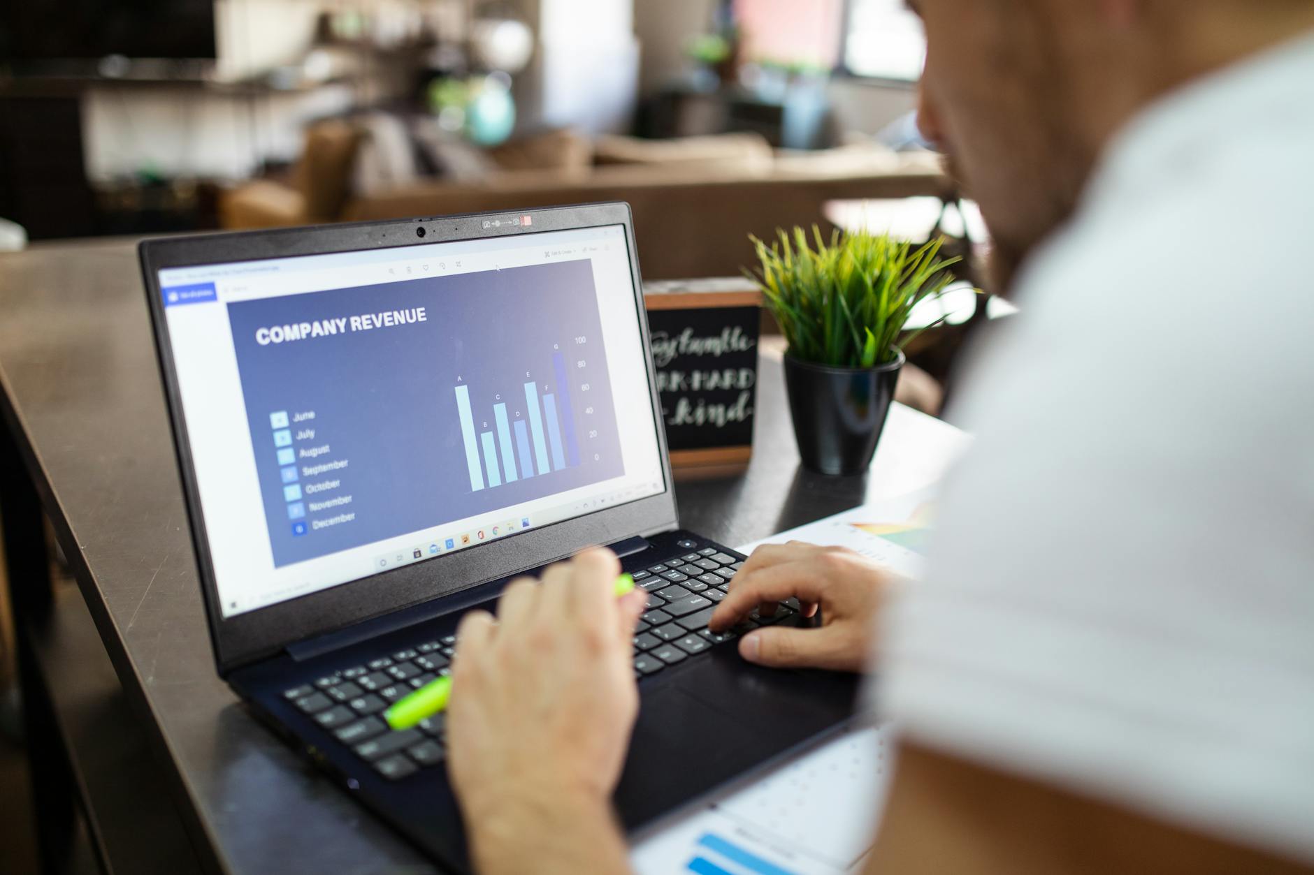 close up shot of a man using a laptop